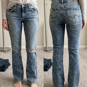 Silver acid wash baby flare jeans